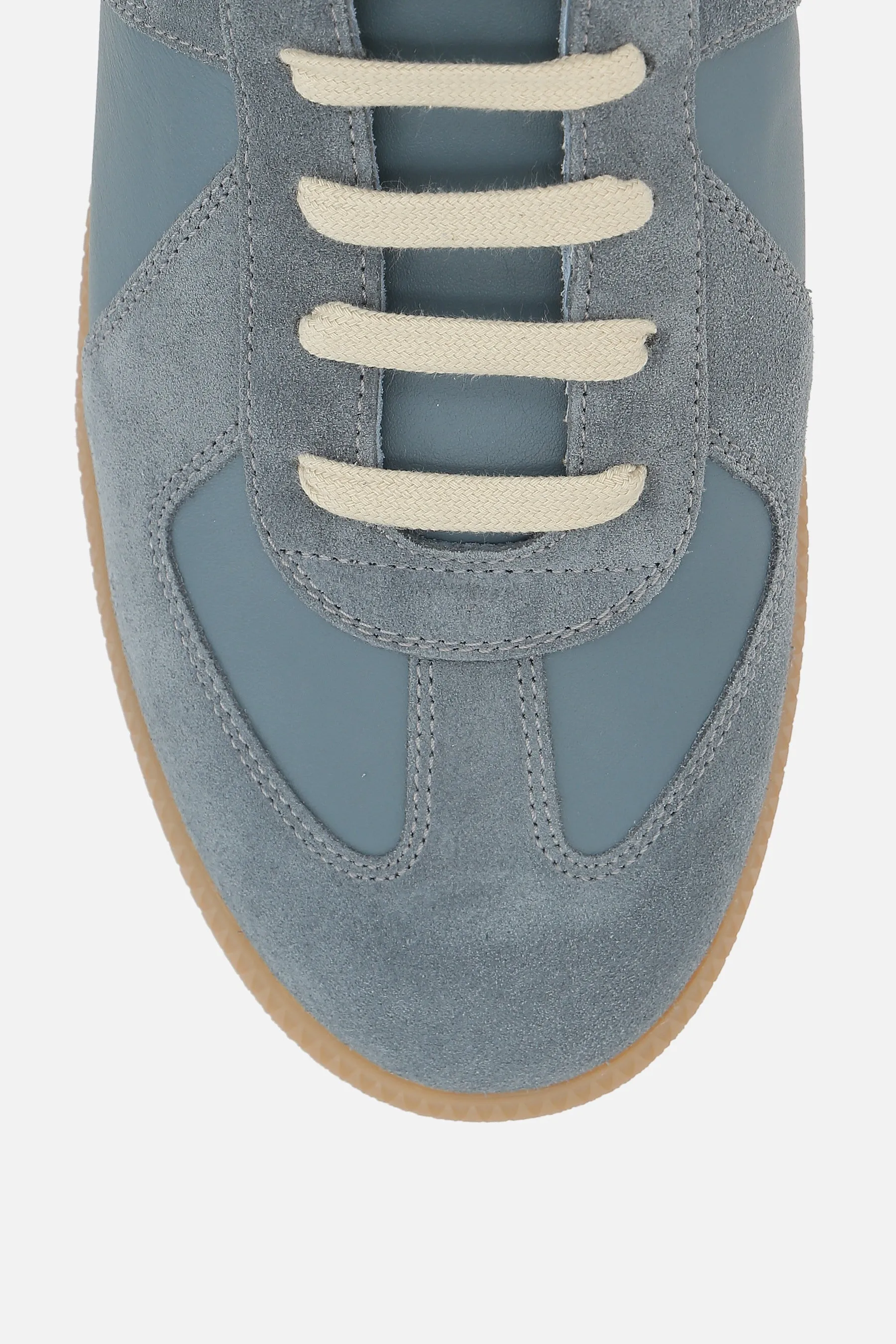 Replica sneakers in leather and suede